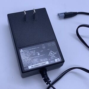 Delta Electronics AC Adapter ADP-18DW BB - Input 100-120V~0.5A 60Hz - Output 12V